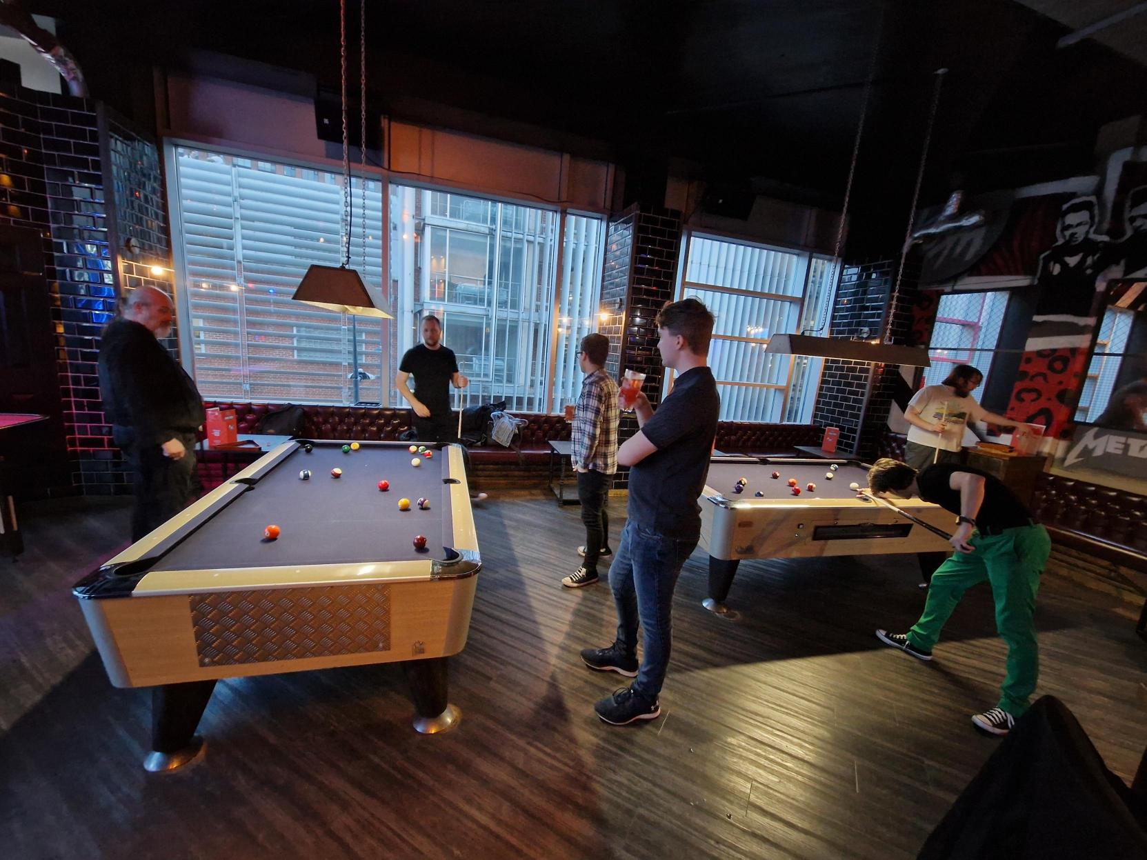 Team playing pool 